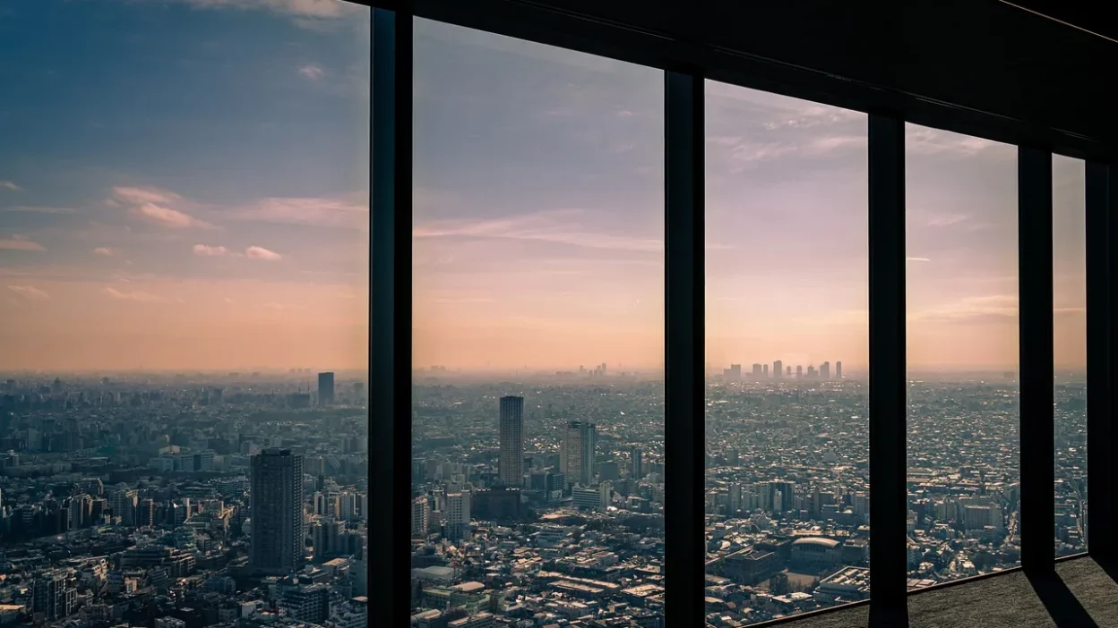 Comparison of kitchen window treatments: blinds, Roman shades, and cafe curtains in a modern kitchen setting.