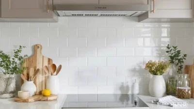 Stylish kitchen countertop with organized essentials, plants, and decorative items for a clean, updated look