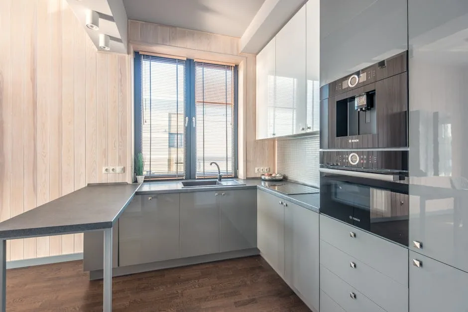Modern Kitchen Window With Clean Faux Wood Blinds