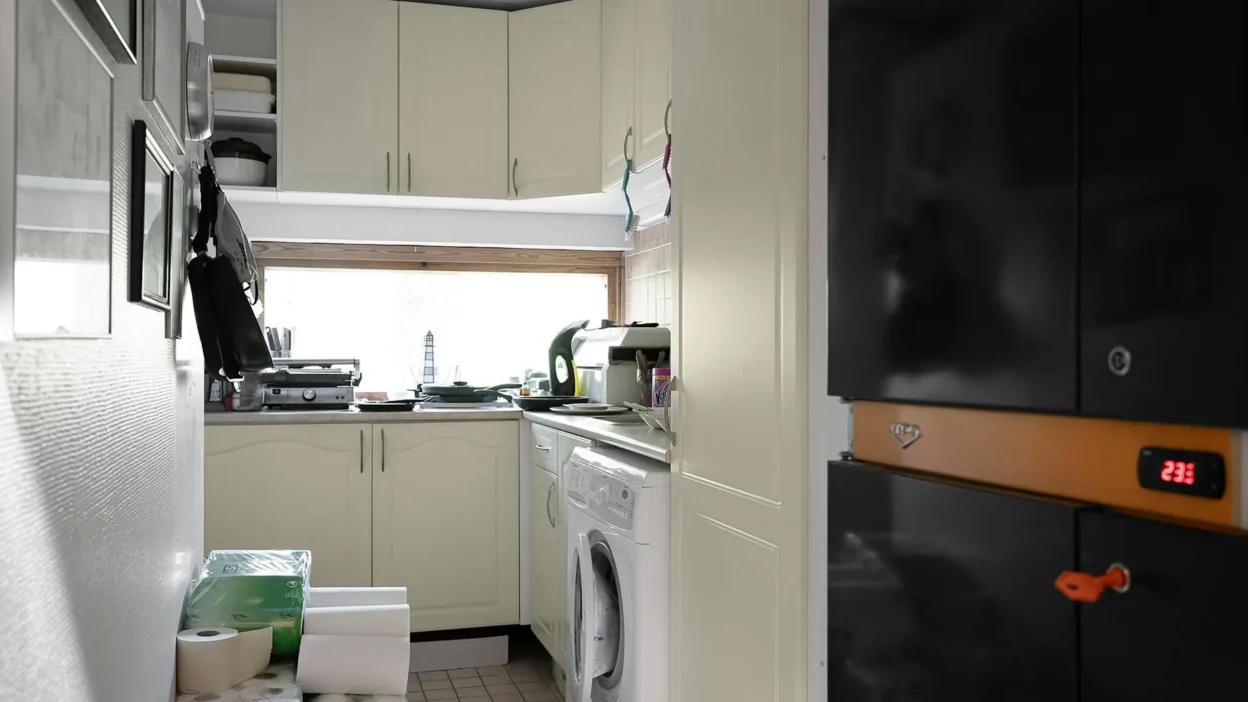 Before and after of a small kitchen refresh showing budget-friendly upgrades like new cabinet hardware and backsplash.