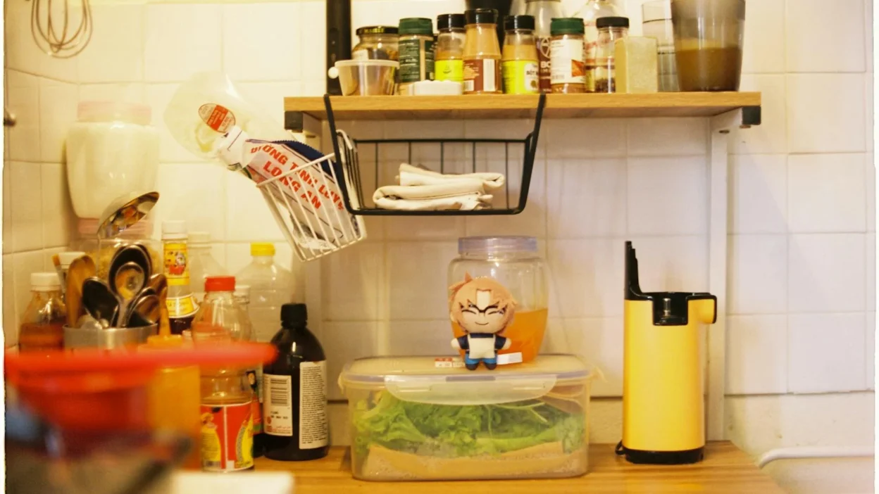 A cluttered kitchen countertop before and after a minimalist refresh with safer editing tips.